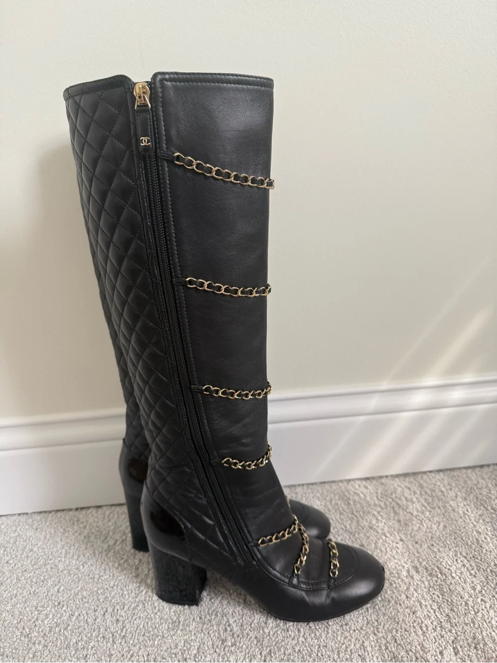 CHANEL Black knee-high lambskin leather boots